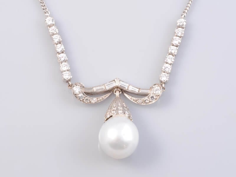 A Diamond and Pearl Necklace. £2,500