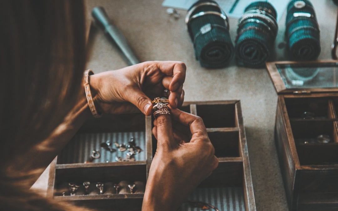 Jeweller-Selecting-Rings