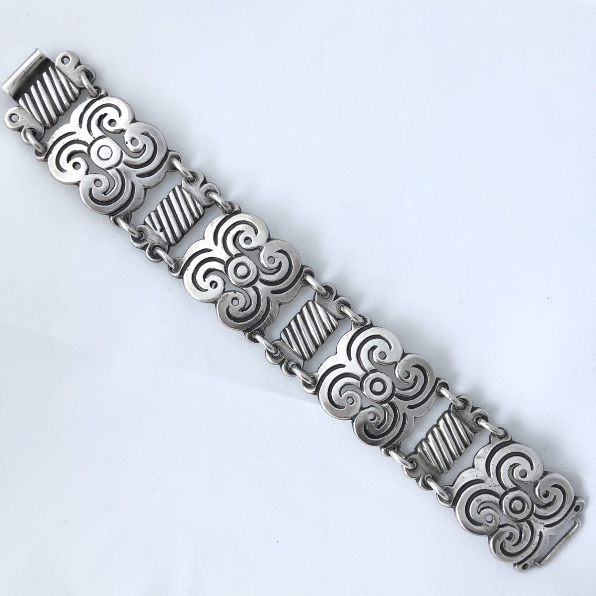A Vintage Mexican Silver Bracelet with Scroll and Reeded Design