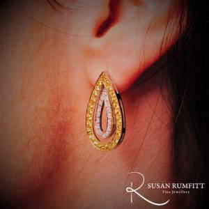pair of diamond pendant earrings