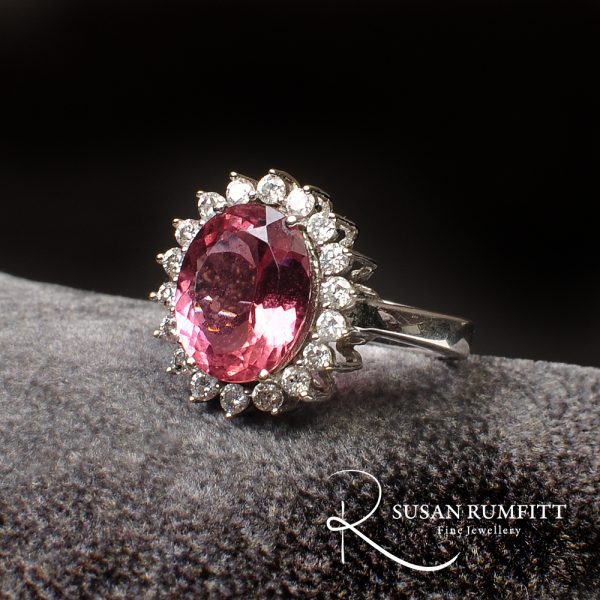A Tourmaline and Diamond Halo Ring in White Gold