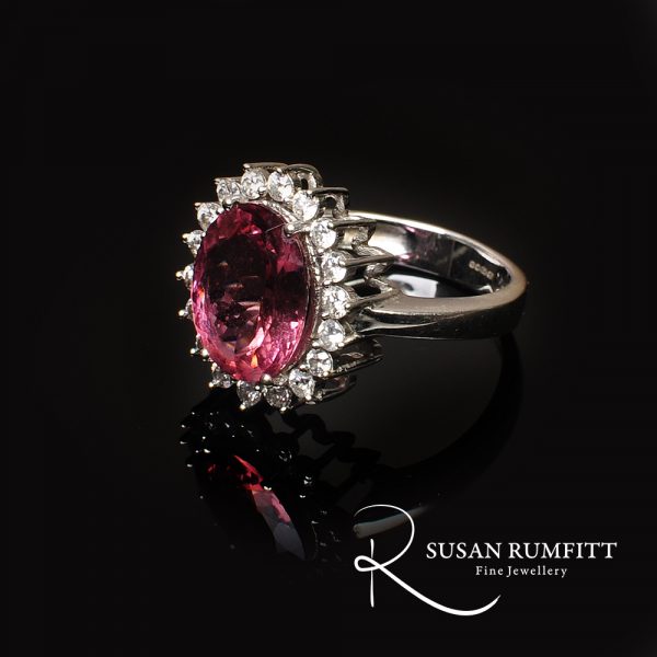 A Tourmaline and Diamond Halo Ring in White Gold