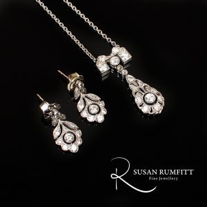 A set of Art Deco Style Diamond Necklace and pendant drop Earrings