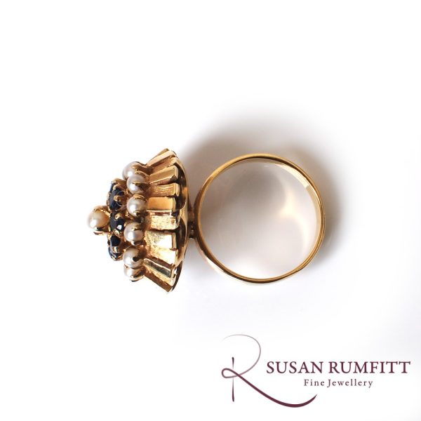 A Sapphire and Cultured Pearl Floral Bombe Cocktail Ring, circa 1960