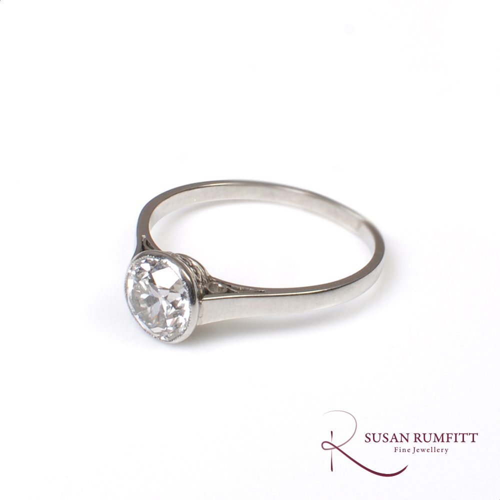An old cut diamond solitaire in new Edwardian-style ring