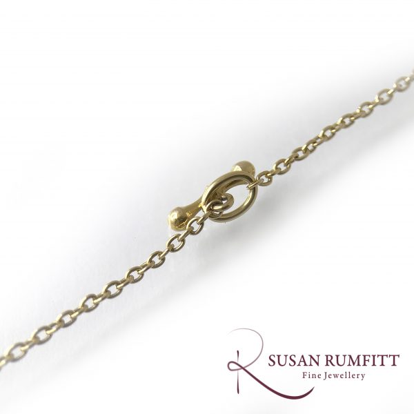 An Art Nouveau Amethyst, Peridot and Seed Pearl Suffragette Pendant