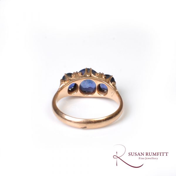 A Victorian three stone sapphire ring