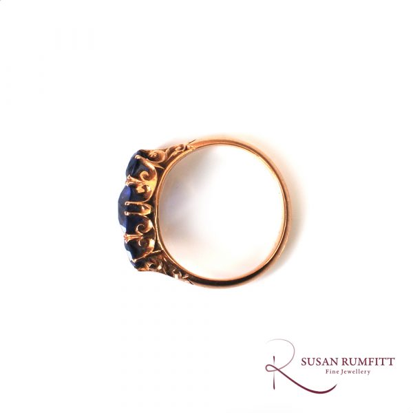 A Victorian three stone sapphire ring
