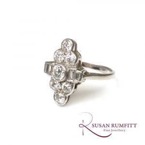 An Art Deco Diamond Dress Ring with Baguettes, circa 1920