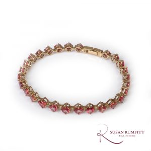 Orange sapphire tennis line bracelet