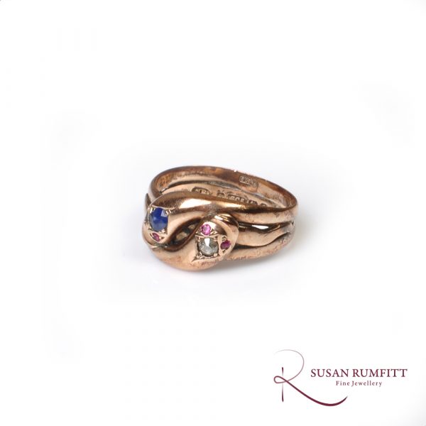 An Antique Diamond, Sapphire and Ruby Serpent Ring, circa 1900
