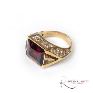 A Garnet, Heliodor, and Diamond Cocktail Ring