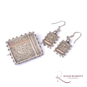 A Late Victorian Silver and Gold Brooch and Earrings Set, Circa 1880