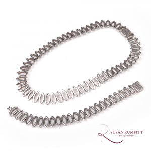 A Mid-Century Modernist Silver Collar Necklace & Bracelet Set