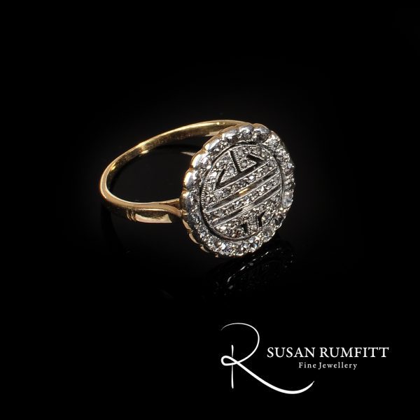 An Antique Diamond Circular Dress Ring