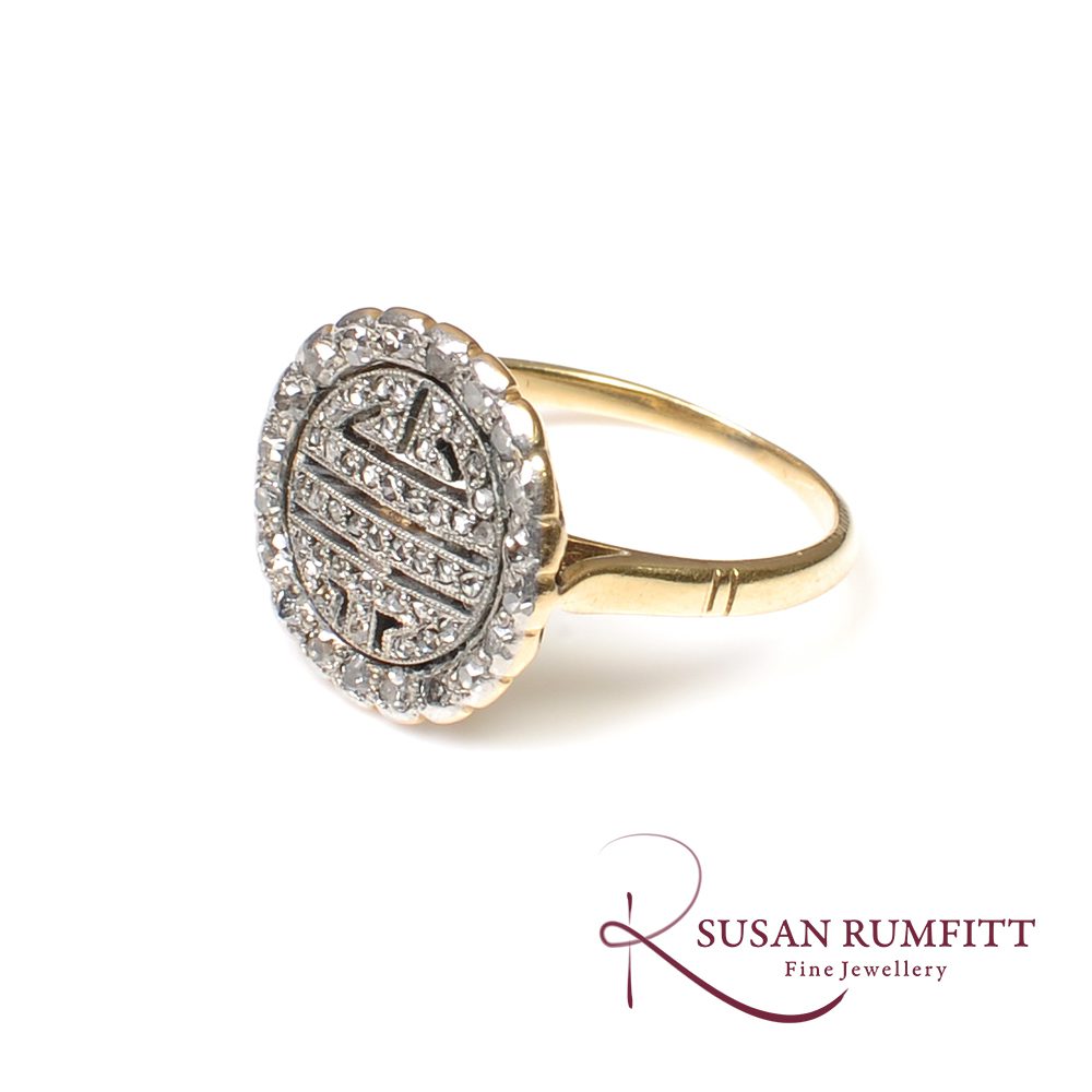 An Antique Diamond Circular Dress Ring