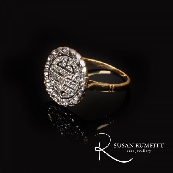 An Antique Diamond Circular Dress Ring