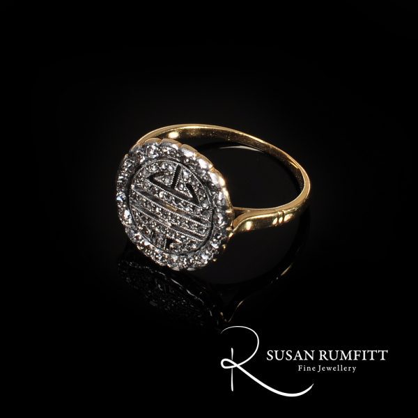 An Antique Diamond Circular Dress Ring
