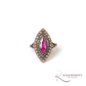 An Antique Ruby, Diamond, and Pearl Marquise Shape Ring