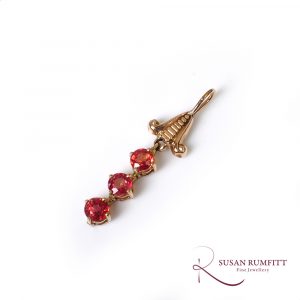 An Orange Sapphire Drop Pendant