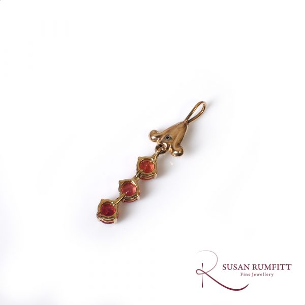 An Orange Sapphire Drop Pendant