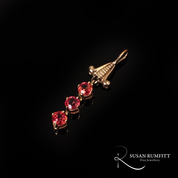 An Orange Sapphire Drop Pendant