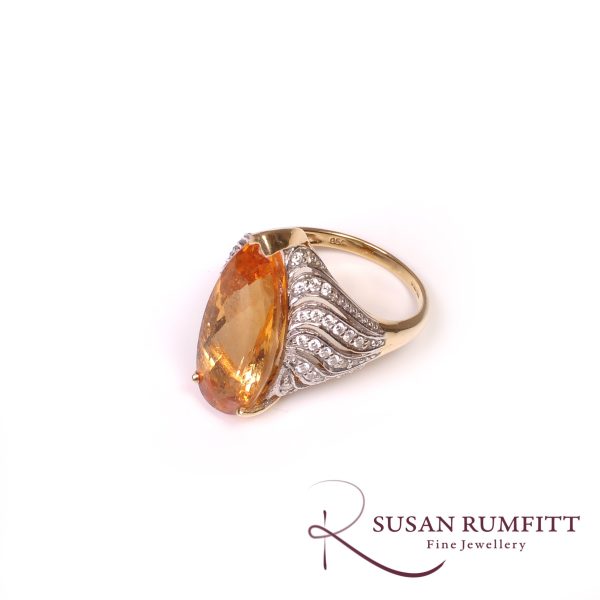 An Imperial Topaz and Diamond Cocktail Ring