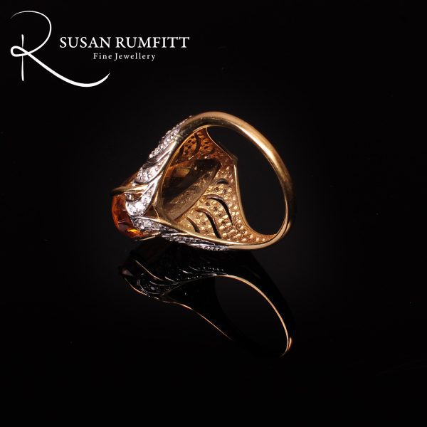 An Imperial Topaz and Diamond Cocktail Ring