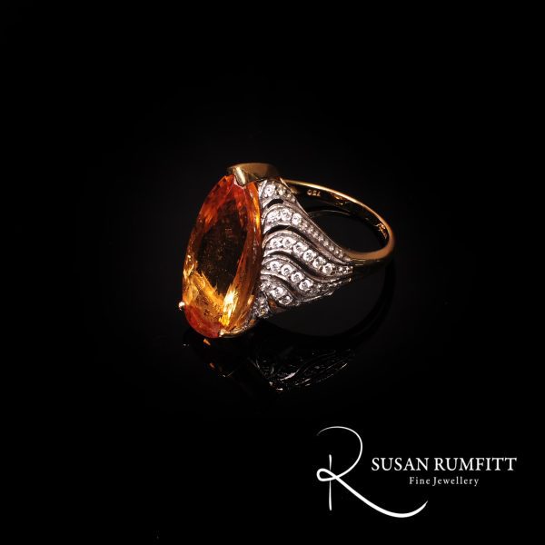 An Imperial Topaz and Diamond Cocktail Ring