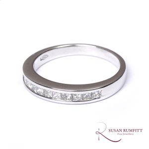 A Square Princess Cut Diamond Half Eternity Ring