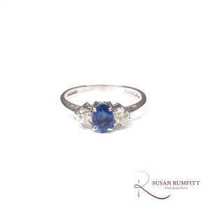 A Sapphire and Diamond Three Stone Ring