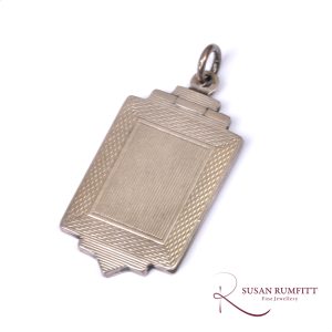 A Silver Art Deco Locket