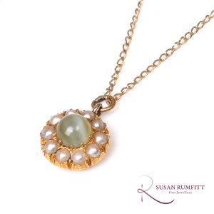 An Antique Cat's Eye Chrysoberyl and Seed Pearl Pendant Necklace
