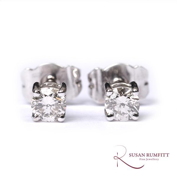 A Pair of round cut 0.42carat Diamond Stud Earrings