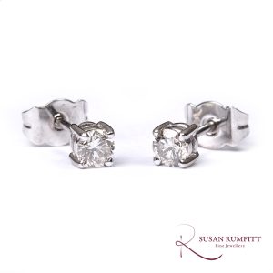A Pair of round cut 0.42carat Diamond Stud Earrings