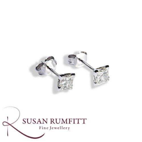 A Pair of Princess Cut Diamond Stud Earrings