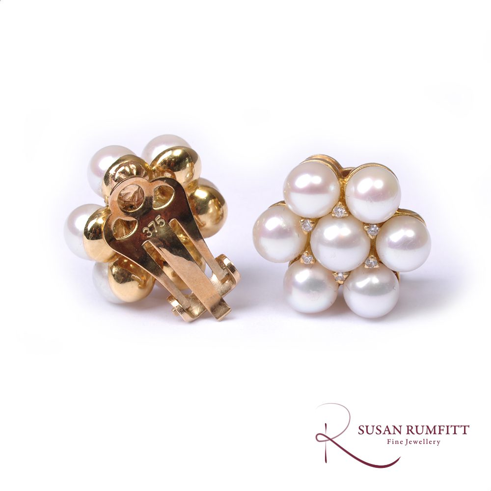 A Pair of Cultured Pearl and Diamond Clip Earrings