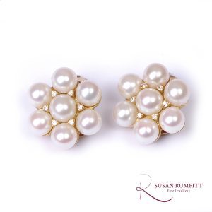 A Pair of Cultured Pearl and Diamond Clip Earrings