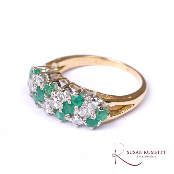 An Emerald and Diamond Dress Ring