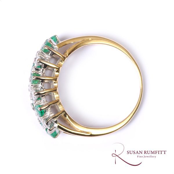 An Emerald and Diamond Dress Ring
