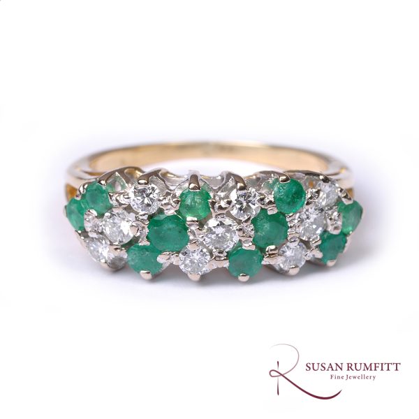 An Emerald and Diamond Dress Ring