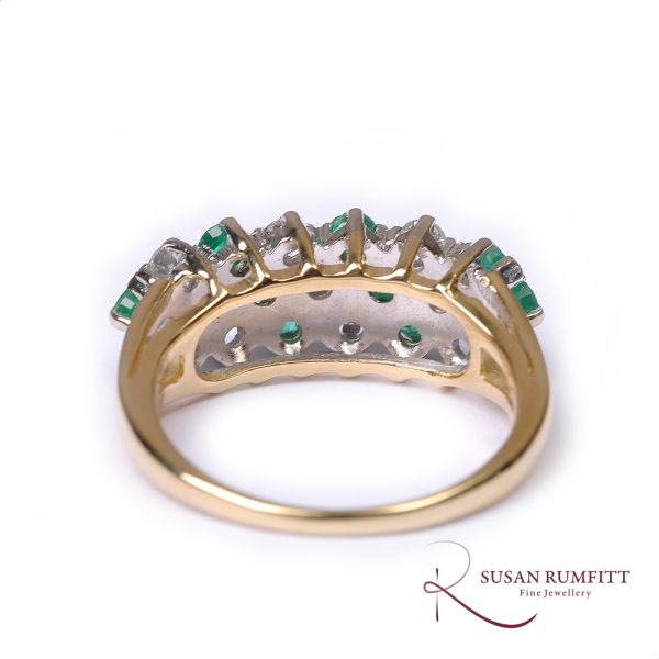 An Emerald and Diamond Dress Ring