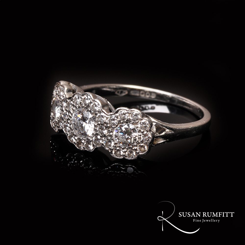 384M Triple Cluster Diamond Ring
