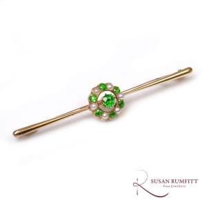 398M An Antique Demantoid Garnet and Pearl Brooch