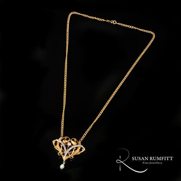 400M A French Art Nouveau Diamond and Pearl Pendant Necklace