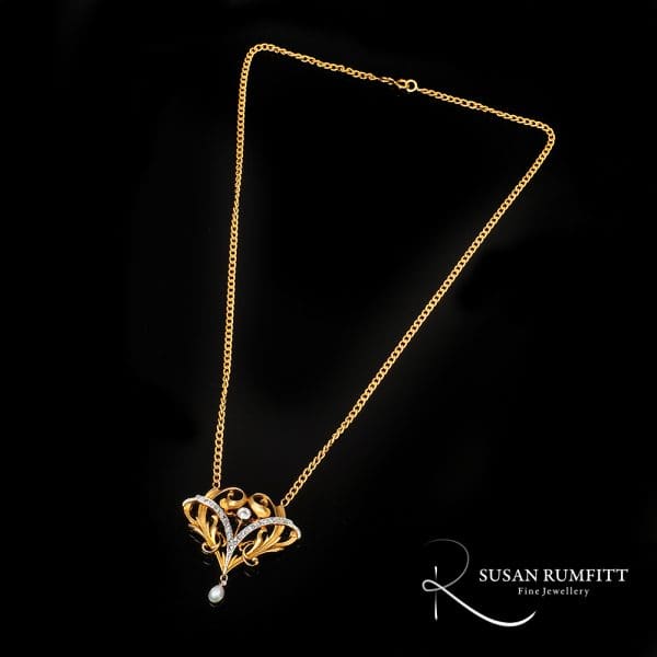 400M A French Art Nouveau Diamond and Pearl Pendant Necklace
