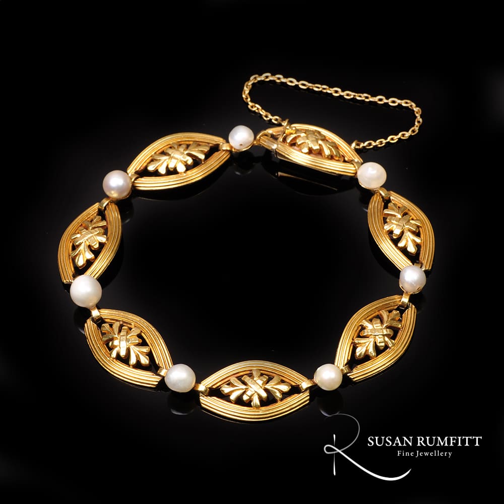 401M An Art Nouveau French Gold and Pearl Bracelet
