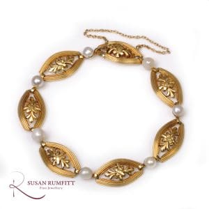 401M An Art Nouveau French Gold and Pearl Bracelet